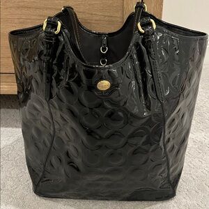 Coach Patent Leather Payton Art Embossed  Tote in black.